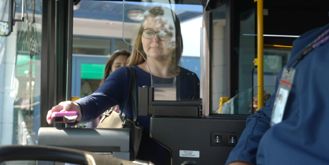 Cost of open payment Person pays bus fare with contactless payment