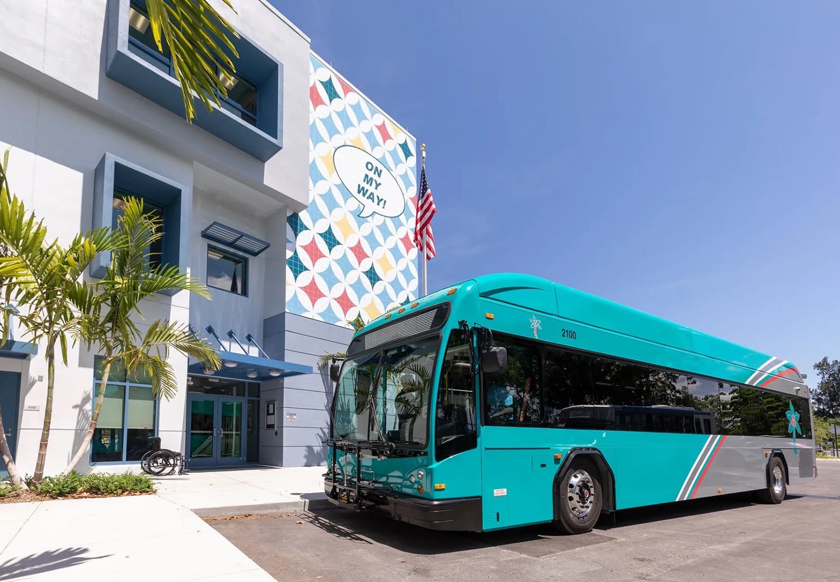 open-payment-palm-tran Palm Tran bus parked next to a building